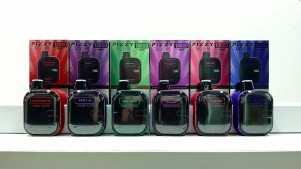 Fizzy 13000 puffs disposable vape - flavor lineup displayed on table with packaging 1